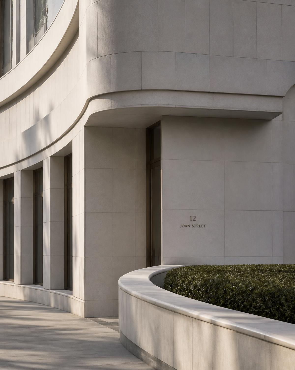Minimal stone facade in soft daylight